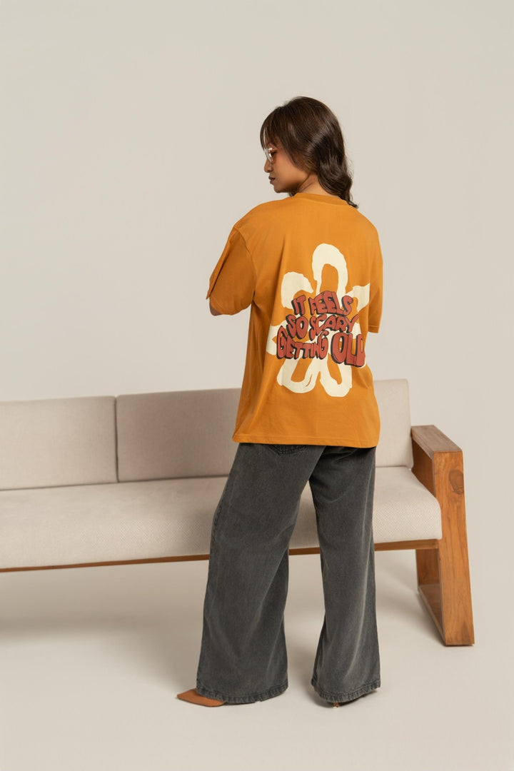 It Feels So Scary Printed Oversized Tee – Brown (For Women) - Gimaq - The magic shuffle!